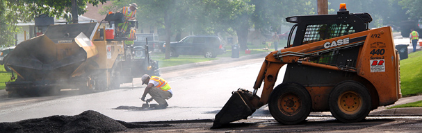 Road crews laying new pavement