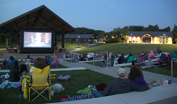 People watching movie at dusk at Huber Park