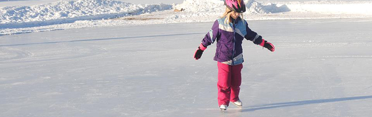 Small girl on ice skates